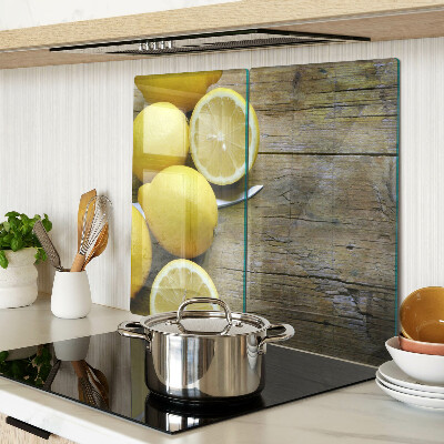 Tagliere in vetro Limoni su uno sfondo di legno