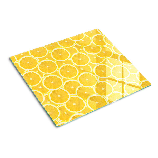 Tagliere in vetro temperato Fette di limone su sfondo giallo