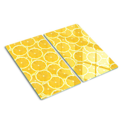 Tagliere in vetro temperato Fette di limone su sfondo giallo