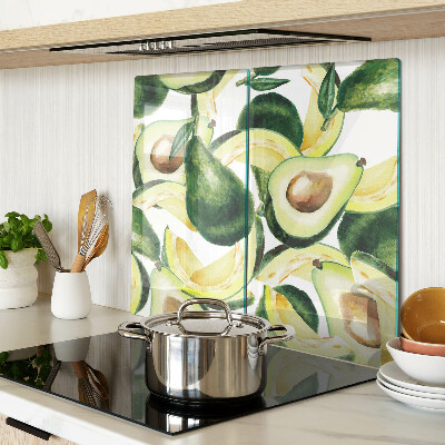 Tagliere in vetro temperato Avocado su uno sfondo di foglie