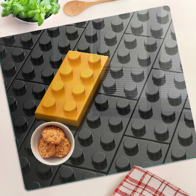 Tagliere in vetro Mattoncini LEGO su sfondo nero