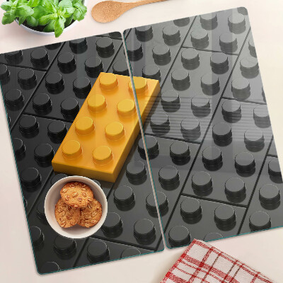 Tagliere in vetro Mattoncini LEGO su sfondo nero
