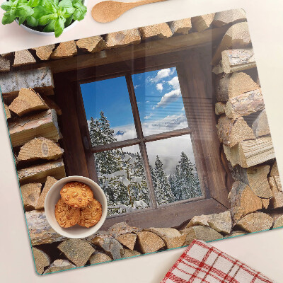 Tagliere in vetro Vista di un paesaggio invernale dalla finestra