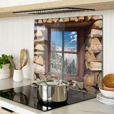 Tagliere in vetro Vista di un paesaggio invernale dalla finestra