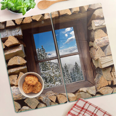 Tagliere in vetro Vista di un paesaggio invernale dalla finestra