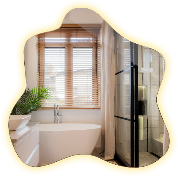 Specchio a forma di macchia illuminato a LED