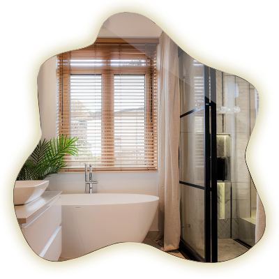 Specchio a forma di macchia illuminato a LED