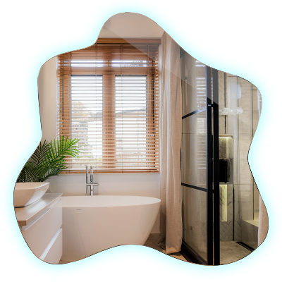 Specchio a forma di macchia illuminato a LED