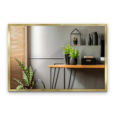 Specchio da parete con cornice dorata elegante