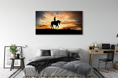 Quadro stampa su tela Una donna su un tramonto unicorno