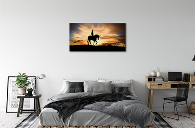 Quadro stampa su tela Una donna su un tramonto unicorno