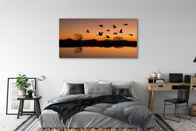 Quadro su tela Sunset di uccelli volanti