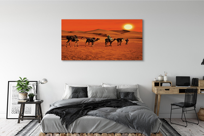 Foto quadro su tela Cammelli persone desertici del sole cielo