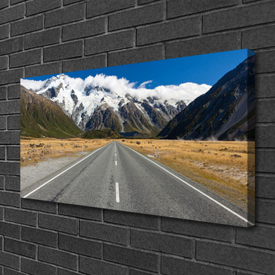 Quadro stampa su tela Strada al paesaggio di neve di montagna