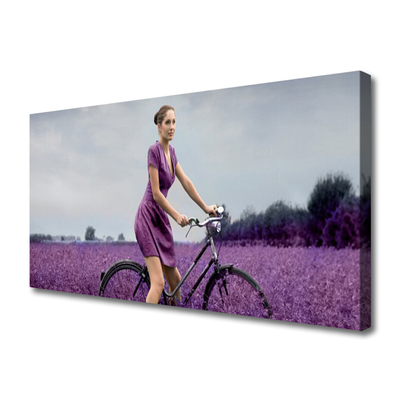Foto quadro su tela Uomo della bici del prato della donna