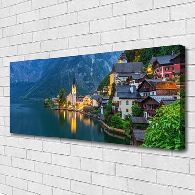 Quadro su tela Città di montagna di notte sul lago