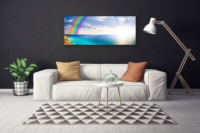 Quadro su tela Un arcobaleno per noi in riva al mare