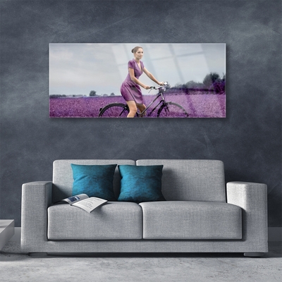 Quadro vetro acrilico Uomo della bici del prato della donna