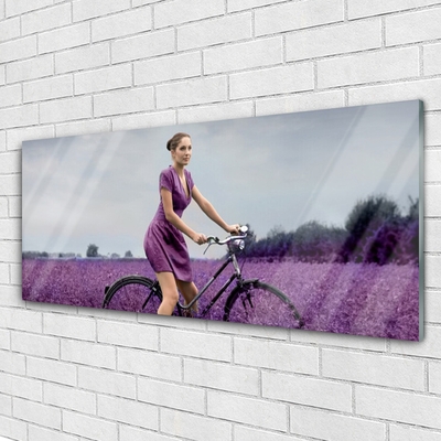 Quadro vetro acrilico Uomo della bici del prato della donna
