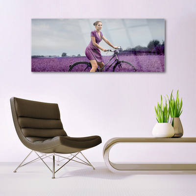 Quadro vetro acrilico Uomo della bici del prato della donna