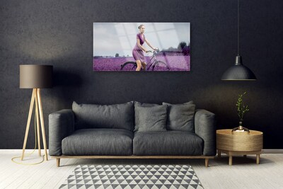 Quadro vetro acrilico Uomo della bici del prato della donna