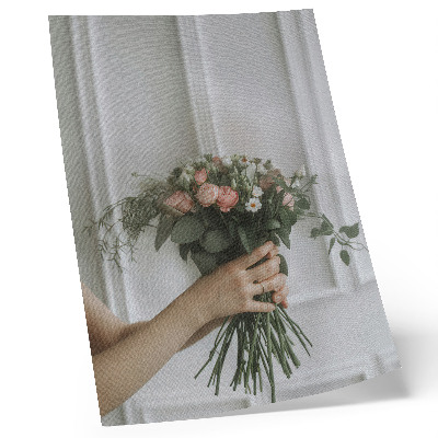 Stampa su tela Un mazzo di rose contro un muro bianco