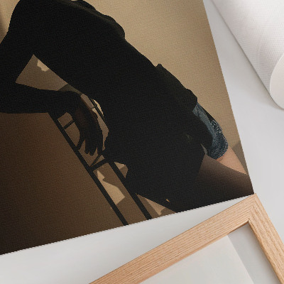 Foto su tela Sagoma scura di una donna, un raggio di luce, pace