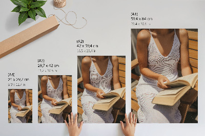 Stampa su tela Donna con un libro, panchina di legno, sole