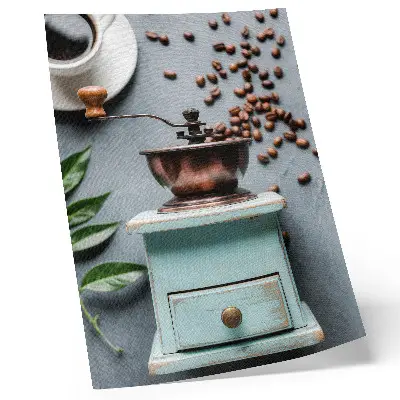 Foto su tela vecchio macinacaffè turchese con chicchi di caffè e foglie verdi