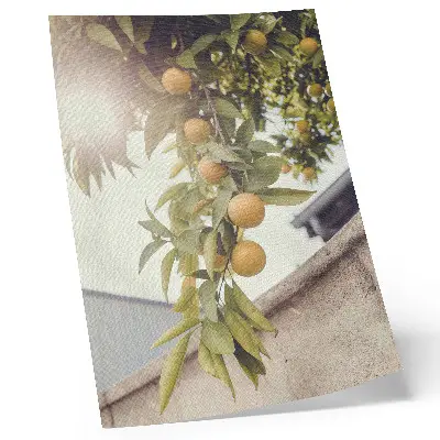 Poster ramo d'albero con sole e foglie verdi e arancioni