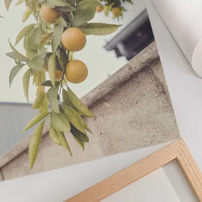 Poster ramo d'albero con sole e foglie verdi e arancioni
