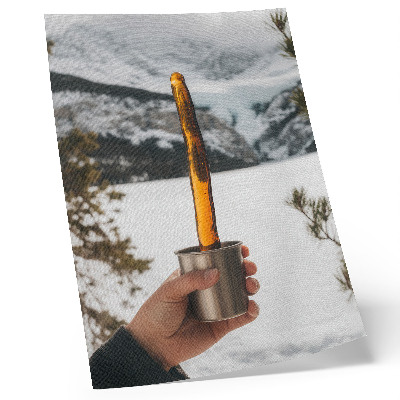 Foto su tela Tazza mano sostanza ambrata montagne neve