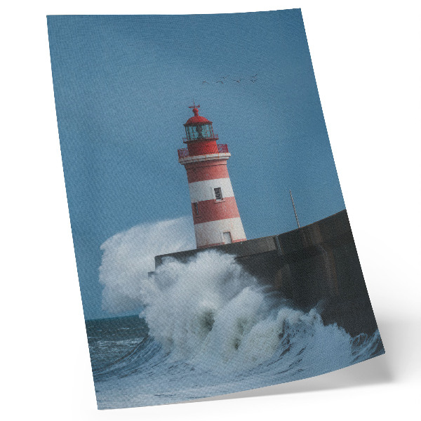 Stampa su tela Faro, cielo azzurro, onde del mare