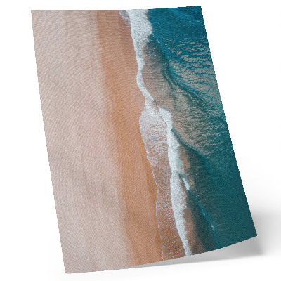 Foto su tela Onde oceaniche che incontrano la spiaggia in modo minimalista