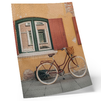 Stampa su tela Una bicicletta sullo sfondo di una colorata facciata retrò.