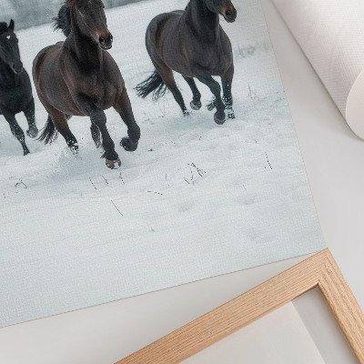 Poster Cavalli neri in movimento su uno sfondo innevato