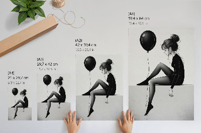 Foto su tela Figura sul bordo con un palloncino che riflette un'emozione