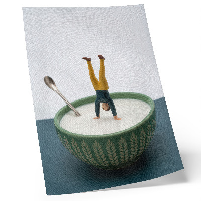 Poster Statuetta in una ciotola di latte con foglie verdi