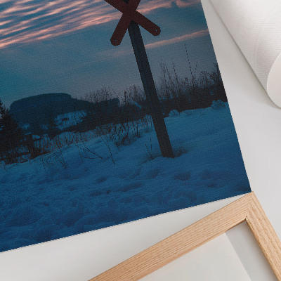 Stampa su tela Paesaggio invernale suggestivo, nuvole colorate, segno solitario