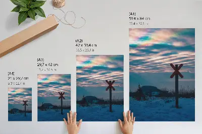 Stampa su tela paesaggio invernale suggestivo con nuvole colorate e un segno solitario
