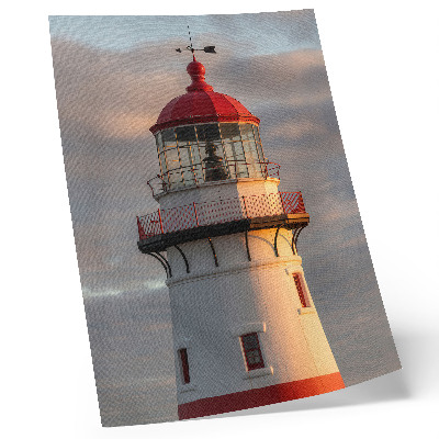 Stampa su tela Tramonto tranquillo con faro rosso