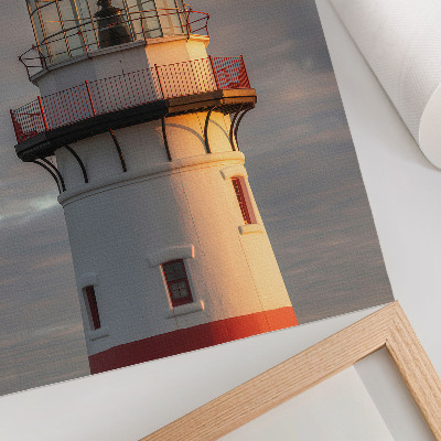 Stampa su tela Tramonto tranquillo con faro rosso