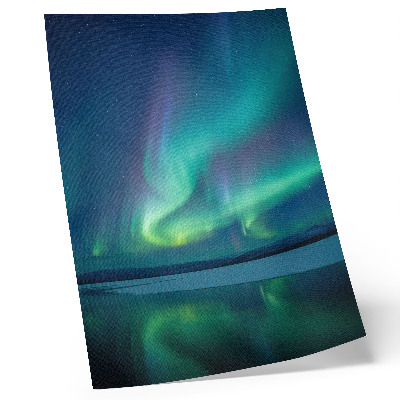 Poster L'aurora boreale sullo sfondo di una splendida natura notturna.
