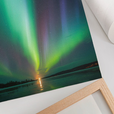 Stampa su tela Aurora boreale su un paesaggio notturno stellato