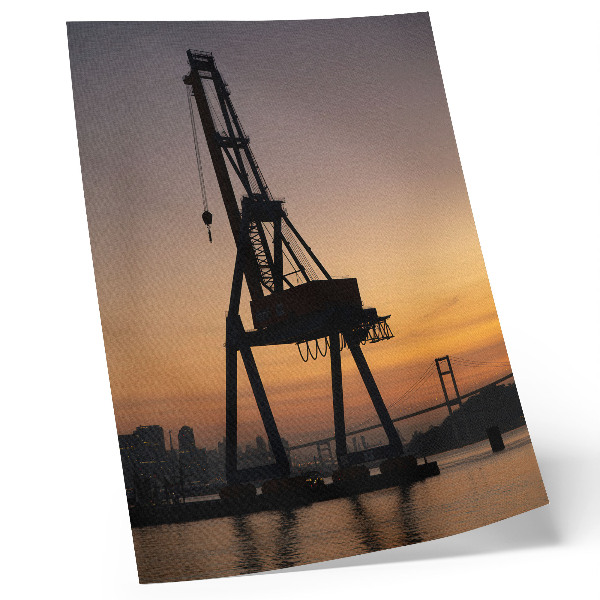 Poster silhouette di gru industriale tramonto ponte