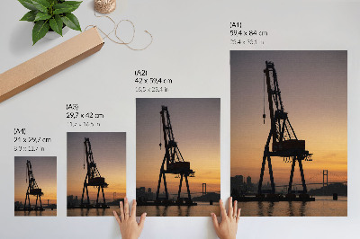 Poster silhouette di gru industriale tramonto ponte