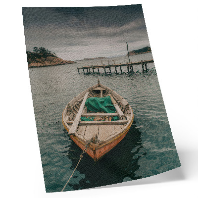 Foto su tela Una barca nella baia, un'atmosfera tranquilla e un fascino naturale.