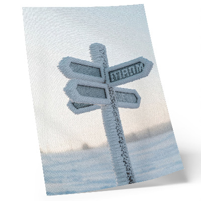 Foto su tela Segnale direzionale innevato, minimalismo invernale