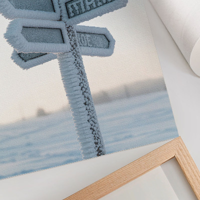 Foto su tela Segnale direzionale innevato, minimalismo invernale