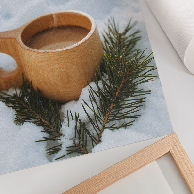 Foto su tela Tazza di legno, paesaggio innevato, ramoscelli verdi